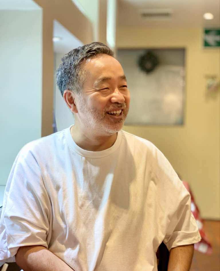 代表　亀井伸二