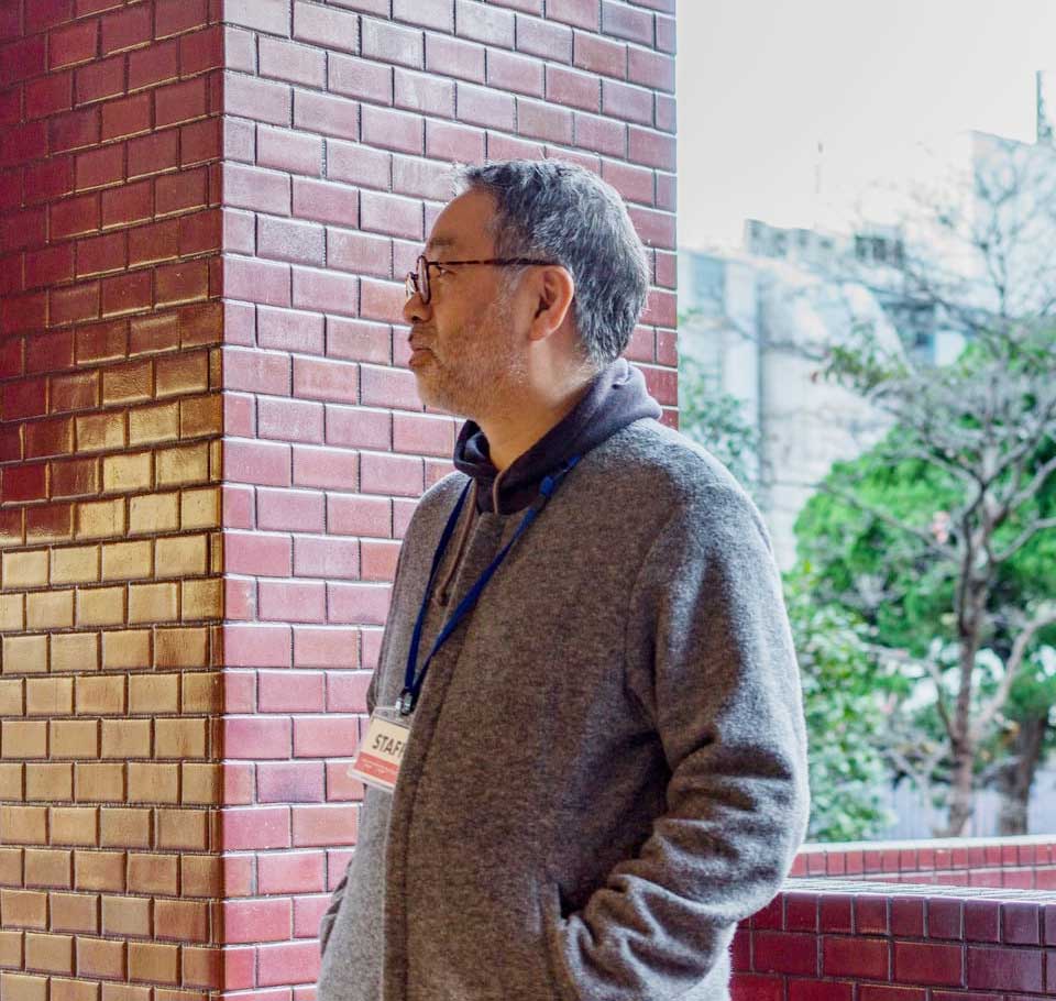 代表 亀井伸二